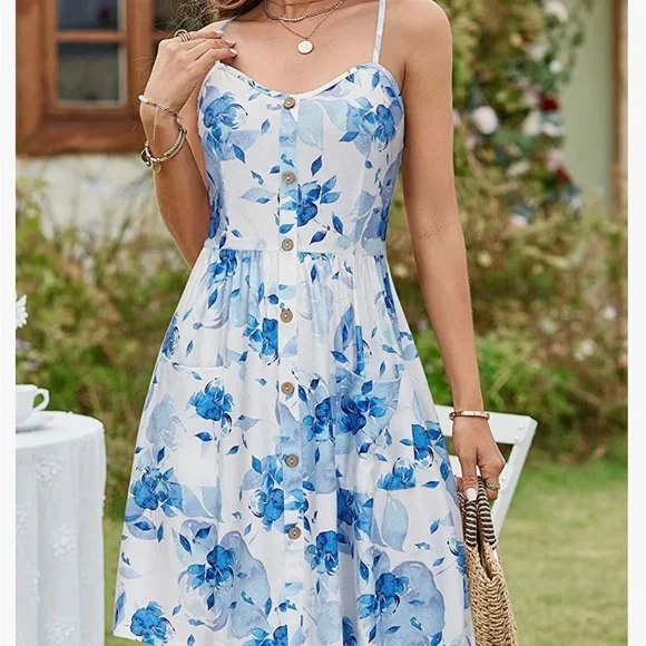 White dress with blue flowers perfect for summer vacation - Picture 2 of 6